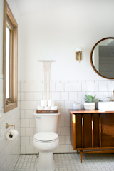Bath, Wood, Vessel, Two Piece, Subway Tile, Ceramic Tile, and Wall The toilet was fairly new, so they left it as it.  Bath Subway Tile Two Piece Ceramic Tile Photos from Before & After: An Outdated Bathroom Gets a Complete Makeover in Just 6 Weeks