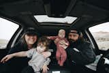 Autumn and Rusty Bailey and their two children.  Photo 11 of 11 in A Couple Transform a Toy Hauler Into a Mobile Tiny Home For $6K