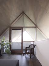 The window system, which was built on site, repeats the simple vernacular geometry of the exterior.&nbsp; &nbsp;