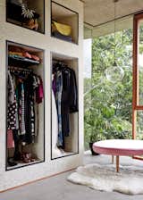Storage Room and Closet Storage Type Hand-printed wallpaper by Erica Wakerly livens up the dressing room.  Photo 14 of 16 in A Funky, Curvaceous Rainforest Home in Australia Hits the Market