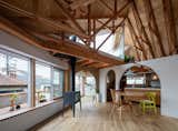 In Kobe, Japan, exposed timber trusses and arched thresholds work together to create a dwelling that’s cheerful and full of whimsy.
