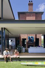 The deep veranda, where a living lounge and outdoor dining area are located, reduces the amount of direct sunlight entering the house, which helps protect the fit-outs, furniture, and fabrics from weathering in the strong Australian sun.&nbsp;