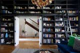 Office, Medium Hardwood, Bookcase, Shelves, Library, and Rug The new layout maximizes the utility of the home's 4,100 square feet.  Office Bookcase Rug Medium Hardwood Photos from A Steel Mesh Curtain Wraps Around This Renovated Australian Home