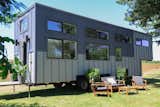 Built on a gooseneck trailer, with a facade of 100-percent recycled steel and flat-pack siding, this ultra-modern tiny home is perfect for frequent traveling.