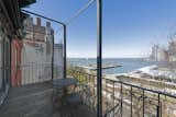 The three-bedroom, two-bathroom flat has several outdoor terraces that look out to panoramic views of Manhattan, the Brooklyn Bridge Park, and the Statue of Liberty.