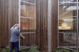 Windows, Sliding Window Type, Picture Window Type, and Wood In winter, the wooden screens can be opened to draw in the warm, afternoon sun.  Photo 13 of 17 in Wooden Screens Shade This Sustainable Melbourne Residence