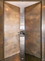 Doors, Swing Door Type, Metal, and Interior A winner of eight architectural awards, One Madison has been designed with a state-of-the-art structural system that includes a rooftop liquid mass damper. Shear walls have also been embedded in the core of the building. 

  Photo 3 of 11 in Tom Brady and Gisele Bündchen's Former Manhattan Apartment Is Listed For $14M