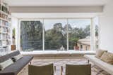 Expansive windows have been installed to flood the house with sunlight and capture sweeping views of the park outside.&nbsp;