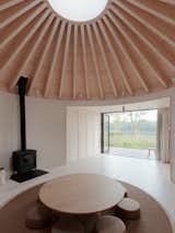 A circular skylight on the top of the domed roof draws in plenty of natural light.