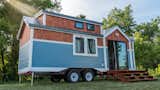 Exterior, Tiny Home Building Type, Metal Roof Material, Camper Building Type, Wood Siding Material, and Gable RoofLine  Photo 1 of 11 in This Svelte Tiny Home Is Being Auctioned For Charity