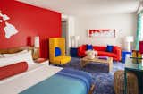 Each guest room follows a color scheme of contrasting primary colors.