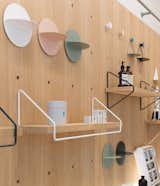 The "life board" shelving and storage system was custom designed&nbsp; by RIGI Design.