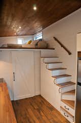 The complex design includes a room under the loft that has an ensuite bathroom.