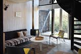 TuCroquis interior designer Ramón Vallejos furnished the cabin with a plywood kitchen, durable furniture from MueblesSur, and washable cushions that can be used both indoors and out.