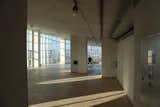 Before: the original windows were retained during the revamp.

  Photo 5 of 19 in Before & After: An Old Equipment Room Is Reborn as a Modern Penthouse