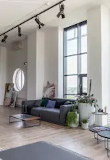 The optimized layout includes an open-plan living room, dining area, and kitchen, along with three bedrooms and three-and-a-half baths.