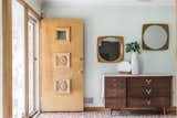 Doors, Swing Door Type, Interior, and Wood The entrance hallway.  Photos from Before & After: A 1952 Midcentury Becomes a Wondrous, Wheelchair-Accessible Home