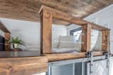 Bedroom, Medium Hardwood Floor, and Bed A peek at the versatile loft space.

  Photo 9 of 12 in Grab This Adventure-Ready Tiny Home For Less Than $54K