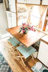 The kitchen table is a maple butcher block from a farmhouse in Old Orchard Beach in Maine.