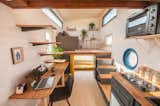 Tiny House Valhalla, designed by Baluchon, features floating steps that lead to a sleeping loft.