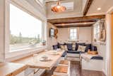 Windows, Wood, and Picture Window Type The dining table can be folded in three sections for different uses.

  Photos from This Canadian Tiny Home Beams a Rustic, West Coast Vibe