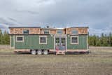 Exterior, Tiny Home Building Type, Small Home Building Type, Wood Siding Material, Metal Roof Material, and Flat RoofLine Smart storage tactics are combined with a U-shaped sofa to maximize space in this delightful tiny home.  Photos from This Canadian Tiny Home Beams a Rustic, West Coast Vibe