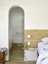Smaller barrel vaults in the master bedroom create uniformity between the interlocking volumes.&nbsp;&nbsp;