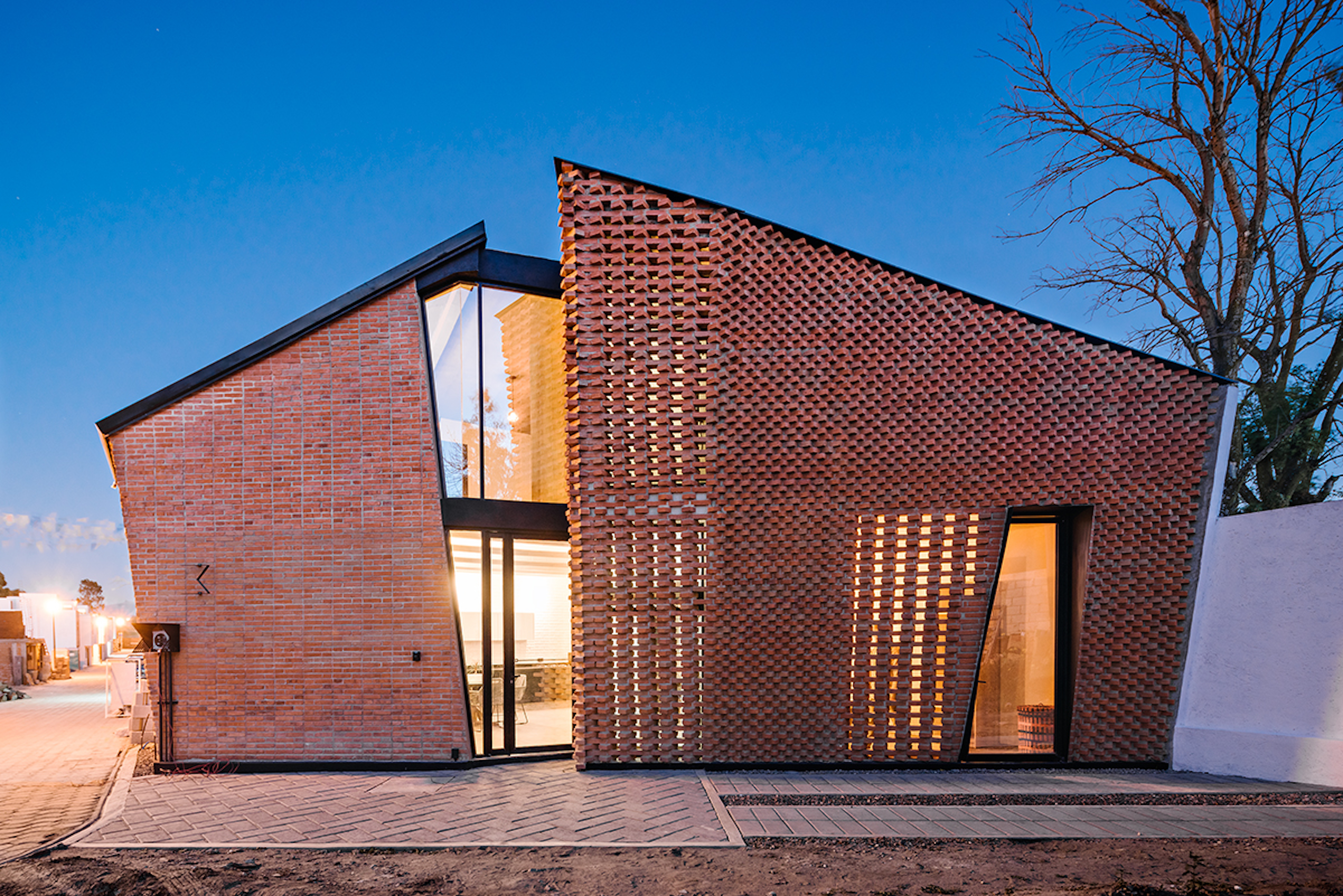 Extruded Red Bricks Create a Gorgeous, Geometric Mexican Home - Dwell