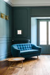 LYGA reconstructed this living space with vaulting that is wider than the existing vaulting and plaster wall frames in a gray-green color.  Photo 6 of 14 in A Renovated Apartment in an 18th-Century Sicilian Building Pays Homage to the Sea