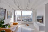 This Bright, White Duplex in Lithuania Showcases Art With Amazing Views