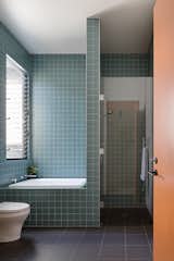 Square Vogue Ceramica tiles give the bathroom a graphic punch.