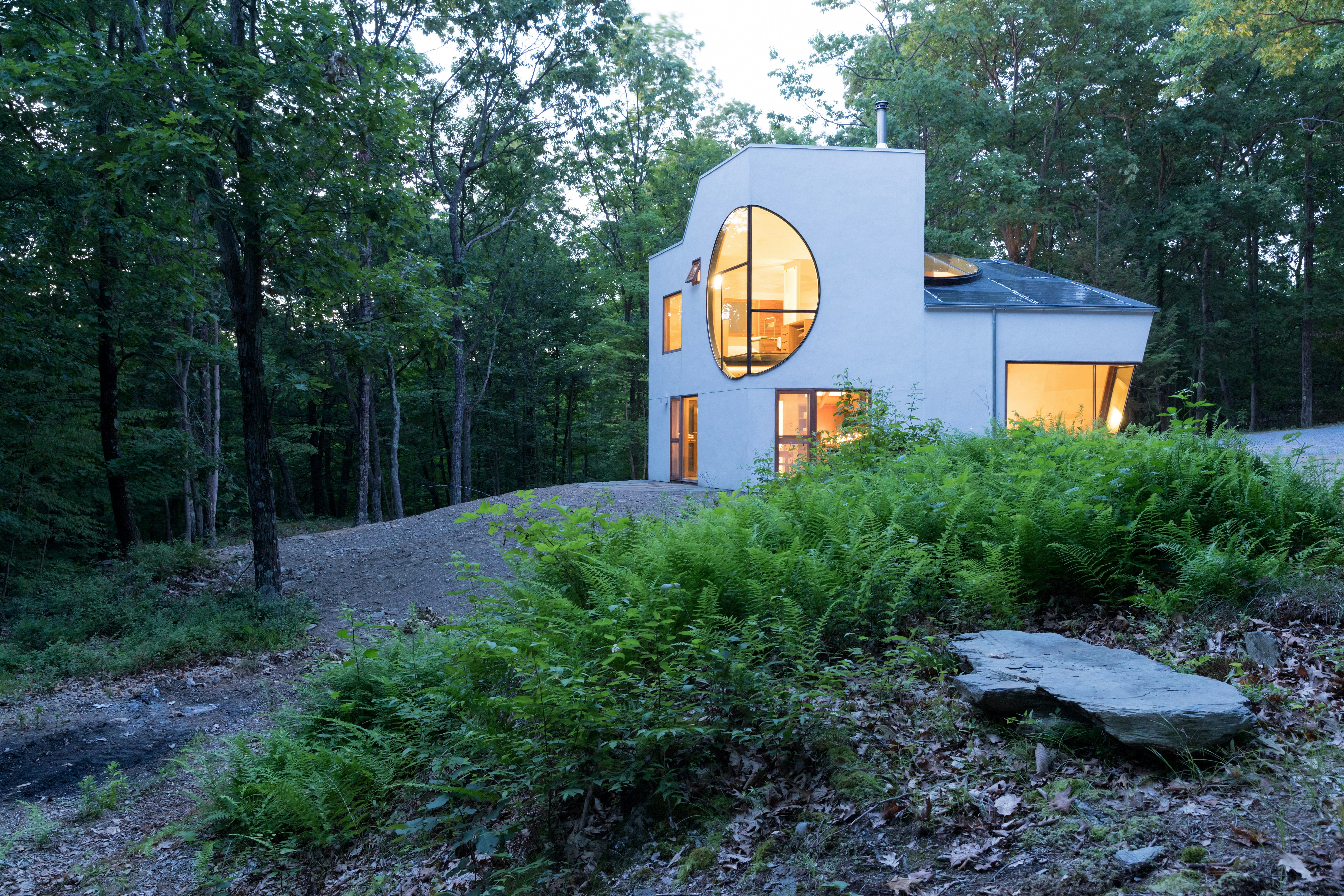 Steven Holl carves boolean voids from Ex of In House in New York state