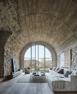 Catalan Farmhouse living room with stone walls