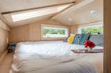 A king-sized bed fits snugly in the loft.