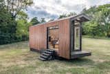 Exterior, Wood Siding Material, House Building Type, Gable RoofLine, Prefab Building Type, Cabin Building Type, and Tiny Home Building Type  Photo 1 of 17 in The Solar-Powered Orchid Tiny House Has a Gorgeous, Light-Filled Interior
