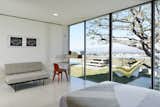 Casa Kundera bedroom with floor-to-ceiling glass windows
