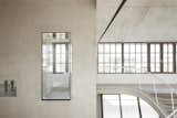 Loft Panzerhalle cantilevered glass shower 