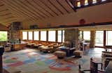 Living Room, Table, Carpet Floor, and Ottomans Taliesin, view to the northeast across living room.  Photo 7 of 17 in 8 Frank Lloyd Wright Buildings Vying For UNESCO World Heritage Status