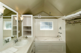 Before: Casey Keasler, founder and creative director of Portland, Oregon-based design firm Casework, updated this attic suite bathroom in a 1912 Seattle home by maintaining the layout and installing new fixtures and finishes.