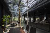 To shield the interiors from strong sunlight, this restaurant in central Ho Chi Minh City is clad in an agricultural net made from polyethylene that was initially developed for agricultural purposes, but quickly found its way into vernacular buildings because of its cost-effectiveness. NISHIZAWAARCHITECTS experimented with the netting, using shadow and light to help compose space.