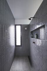 Suntrap House bathroom with gray tile