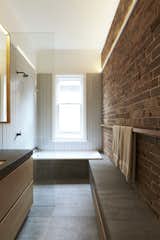 Suntrap House bathroom with exposed brick