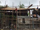 Workers constructing the new house.
