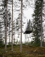 Drawing inspiration from fire towers and Nordic folklore, the PAN Treetop Cabins are two 431-square-feet lofted A-frames that sleep six people each. Elevated 26 feet in the air by steel poles and clad in black oxidized zinc and steel, the structures blend into the forested landscape of Eastern Norway.