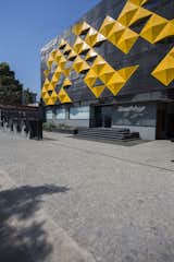 The façade is a play of surface levels  to create synchronicity
