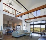 Living Room, Sectional, Medium Hardwood Floor, Pendant Lighting, and Floor Lighting  Photos from Modern Vineyard Farmhouse