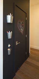 More than a door into  the pantry - a large chalkboard wall