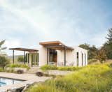 Guesthouse + Poolhouse and view beyond