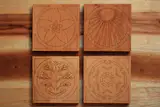 Four Seasons Outline Coasters. Laser cut from plywood, varnished and backed with cork. Available at www.etsy.com/shop/everydayprops.