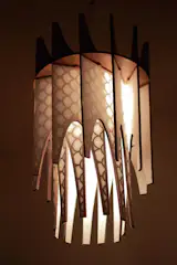 The prototype of the Rio Lamp from Everyday Props. Laser-cut plywood, assembled entirely via sliding notch joinery (no glue or screws required)Walnut finish with a white washi paper top layer.